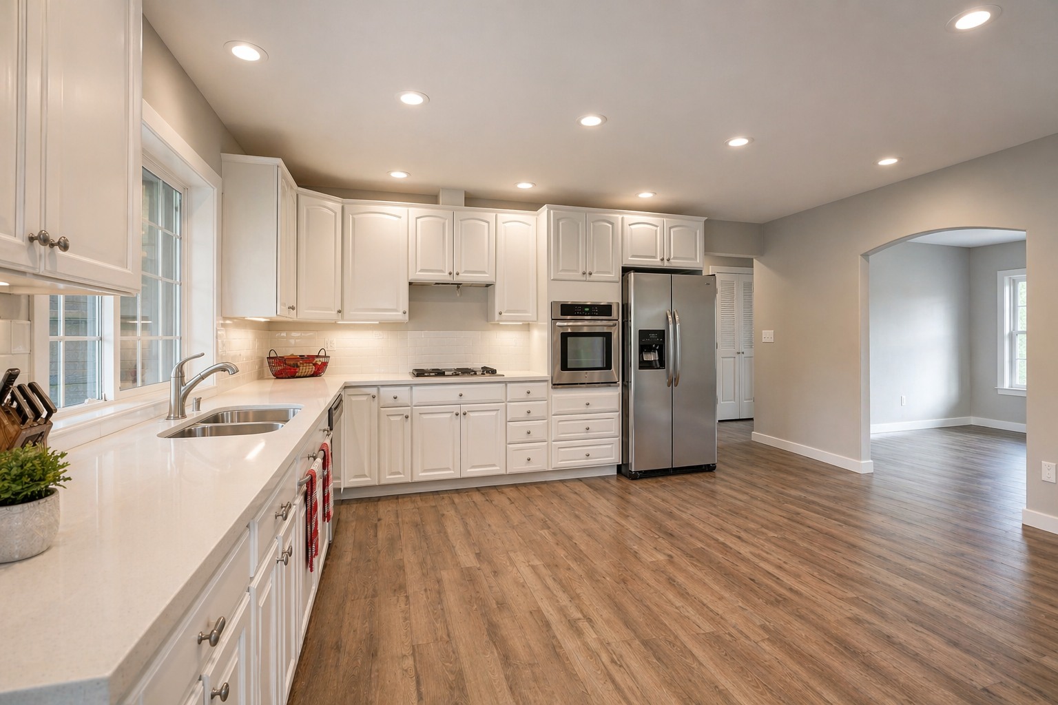 Bright kitchen remodel with new flooring and finishes